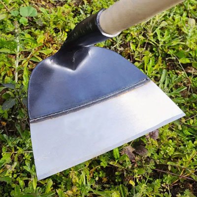 binette jardinage gros plan sur manche de bois