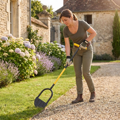 femme utilise taille bordure dans gazon